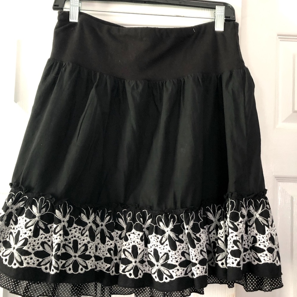 Very unique, boho black skirt with eye catching details.Great, comfy, stylish.